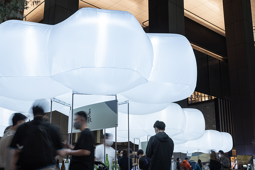 luminous rice-shaped balloons by OKDO invite sake lovers to taste the brew in open-air bar in tokyo