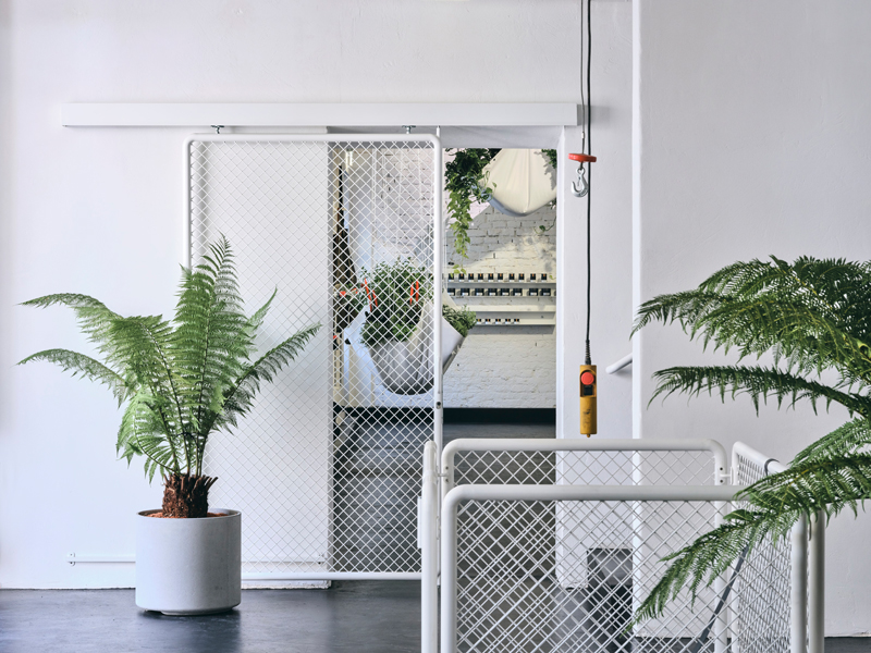 loft-like van den berg spice house in austria is infused with exotic plants and rich aromas