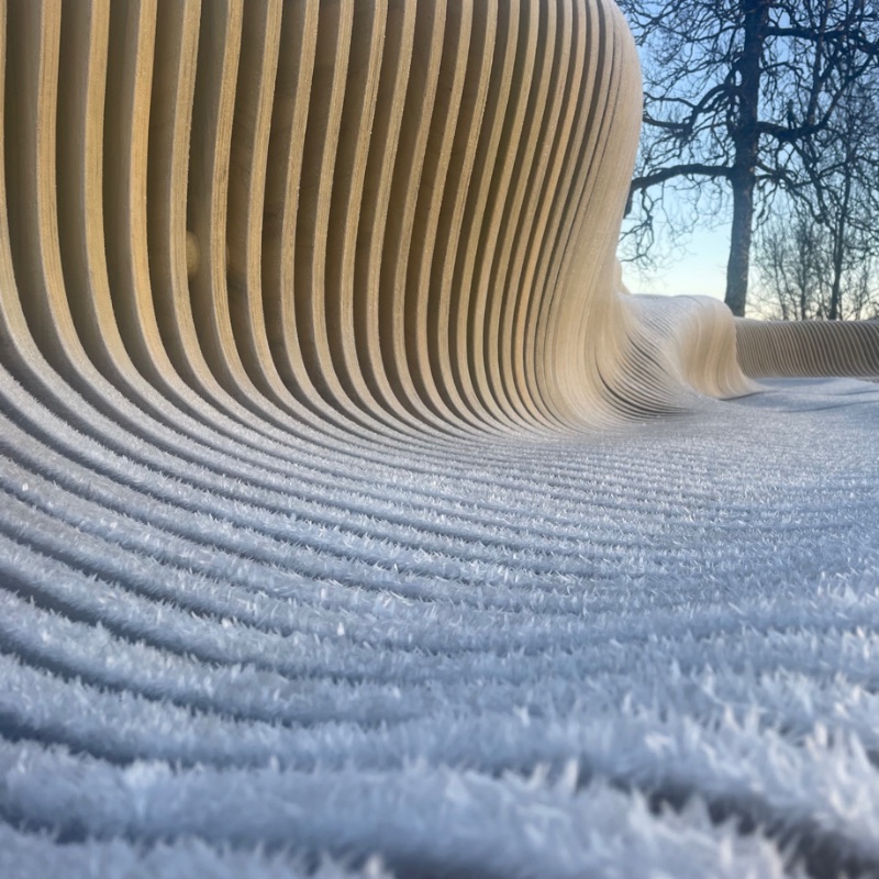 a rippling parametric installation by Bjørnådal Arkitektstudio fosters a sense of community in school in norway