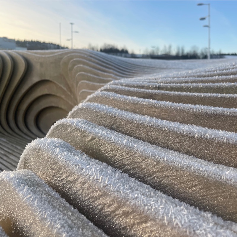 a rippling parametric installation by Bjørnådal Arkitektstudio fosters a sense of community in school in norway