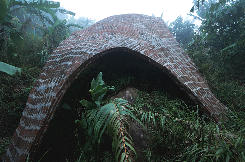 earthscape studio's vaulted cowshed nestles into kerala's hillside