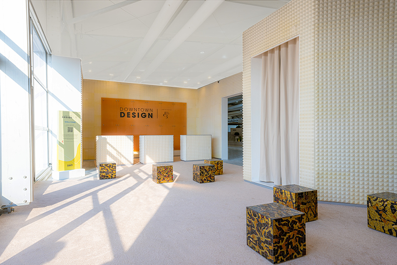 dubai downtown design entry installation fuses gilded mosaic with light, sound, and crystals