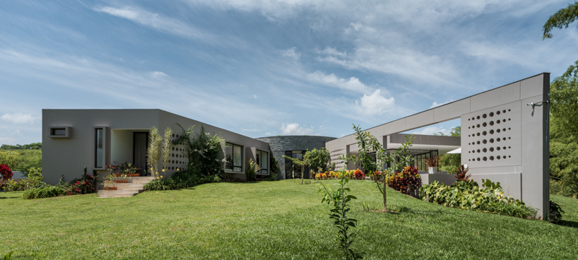 residence's living spaces unfold around circular open courtyard in colombia