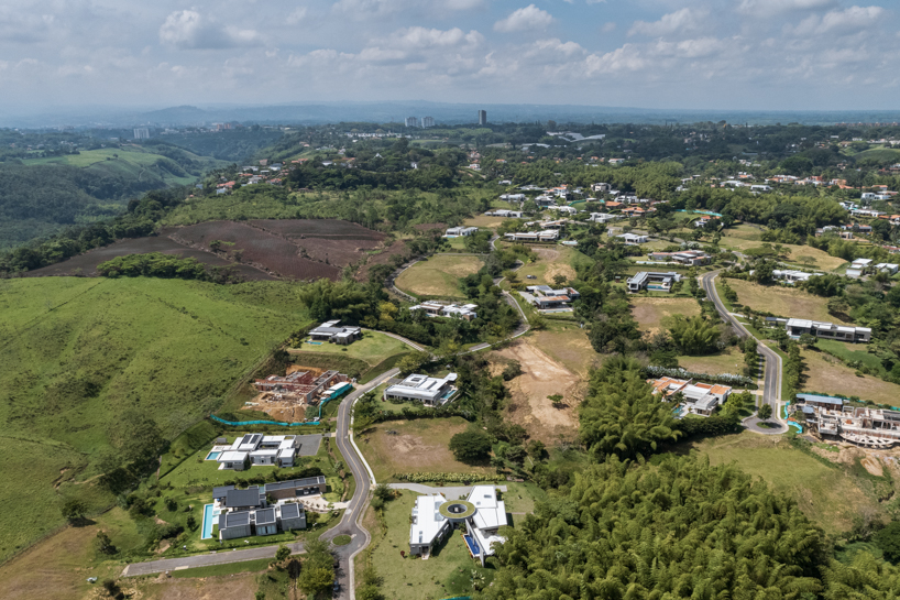 residence's living spaces unfold around circular open courtyard in colombia