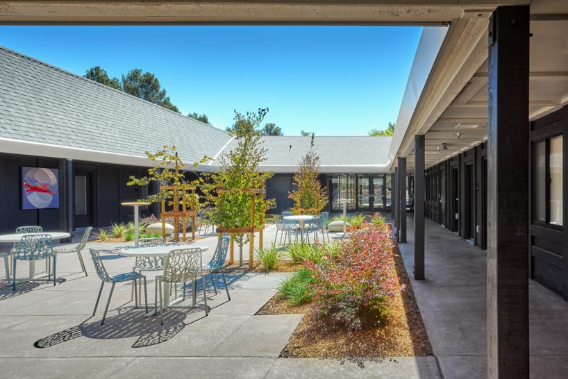 university research facility expands under floating asymmetrical pitched roof in california - 1