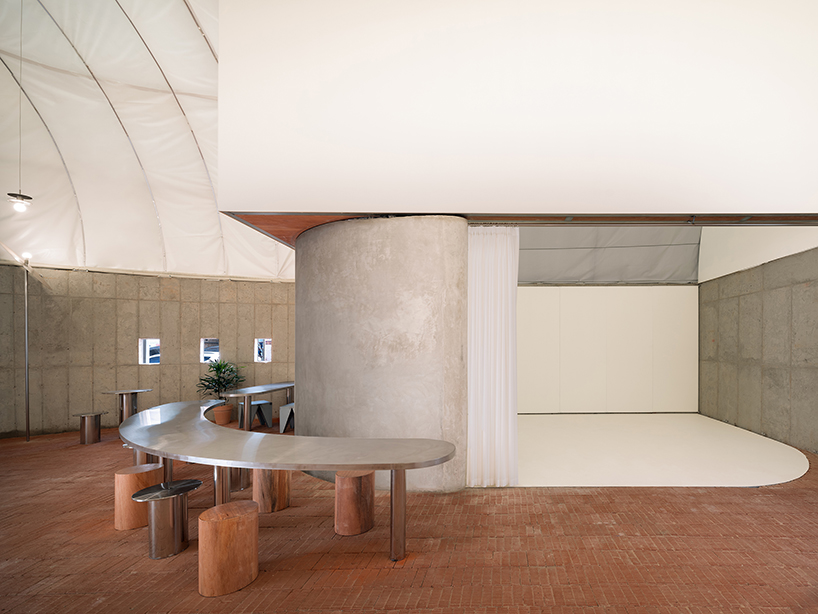 sukchulmok studio imposes PTFE tents onto concrete for photography studio in south korea
