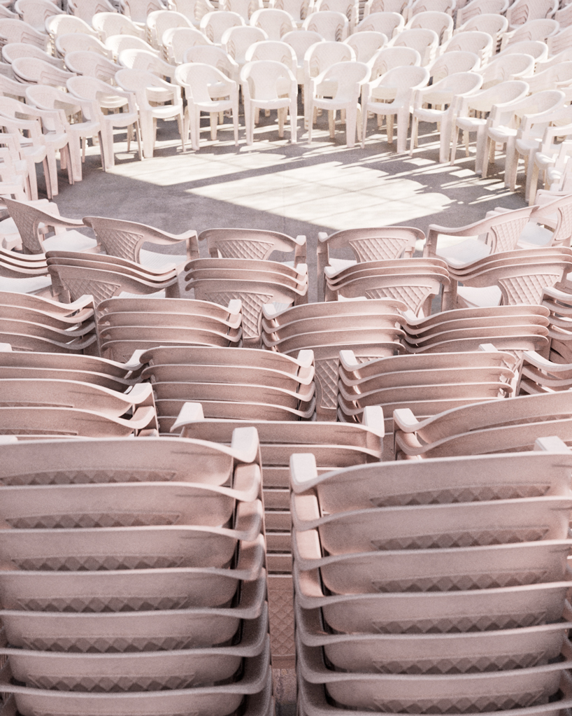 andrea papi's plastic colosseum shaped by stacked chairs brings theatre back to the people