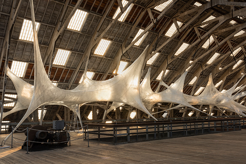 numen/for use stretches giant cocoon-like installation across historic dockyard chatham