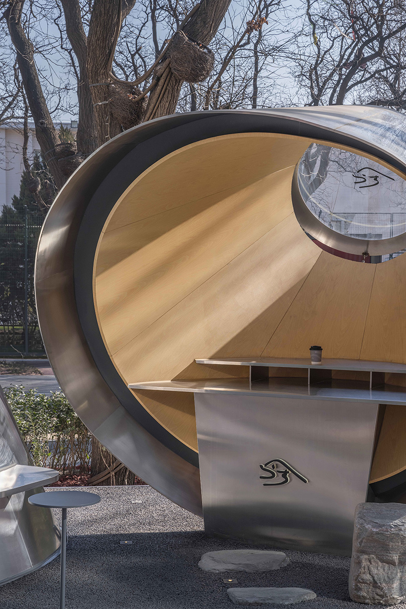 reflective steel volumes reinterpret the pour-over dripper for kurasu’s beijing pop-up pavilion - 5