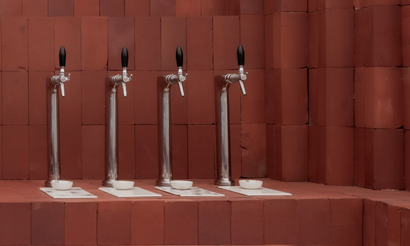 red bricks line the refreshment club's kiln-inspired flagship for parisian porcelain house
