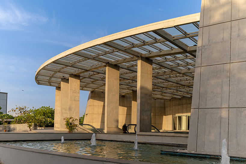 spiraling like a nautilus, INI design studio's aquatic gallery in india fosters immersive learning