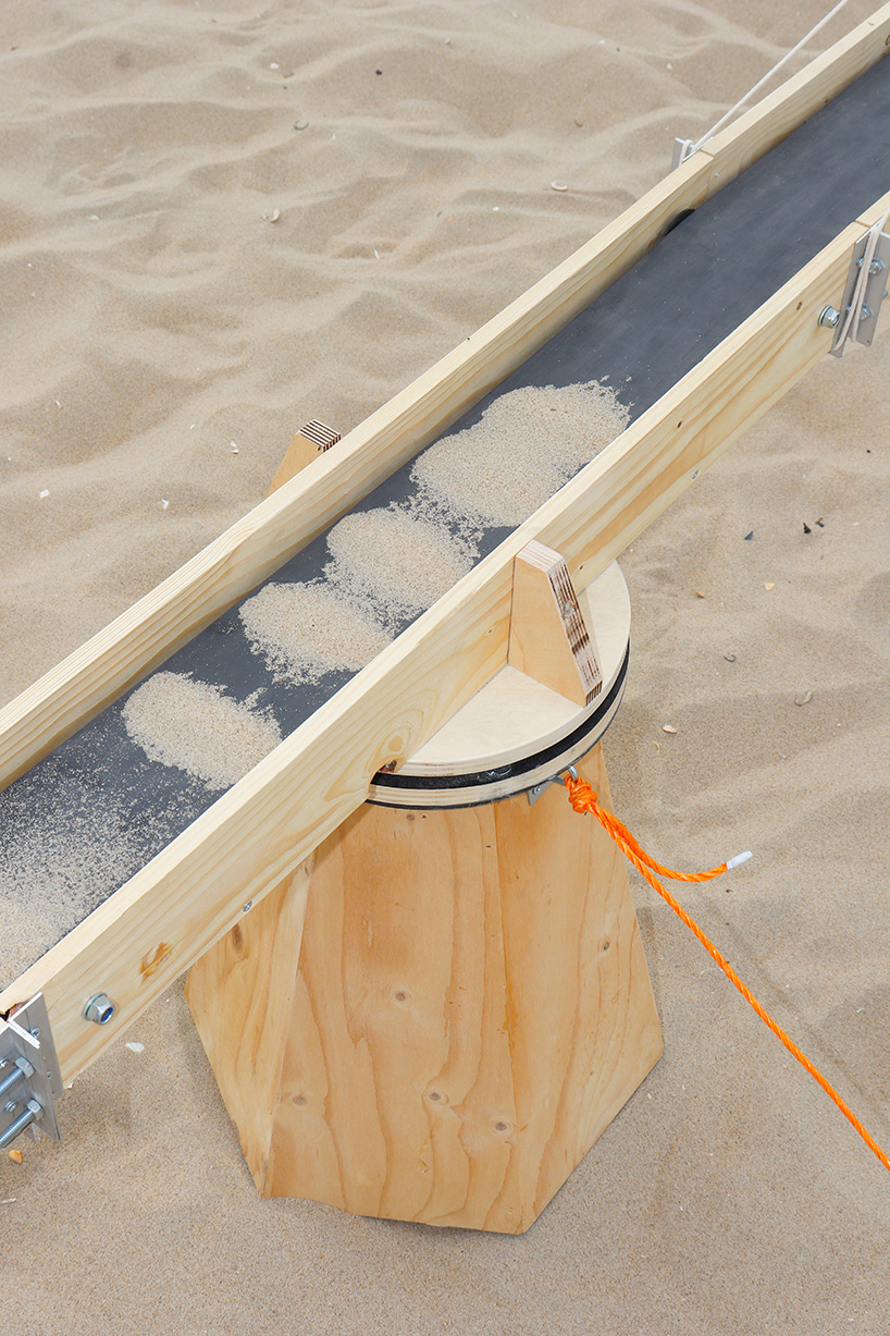 a windmill constructed as a revisit of our relationships with the natural world 4