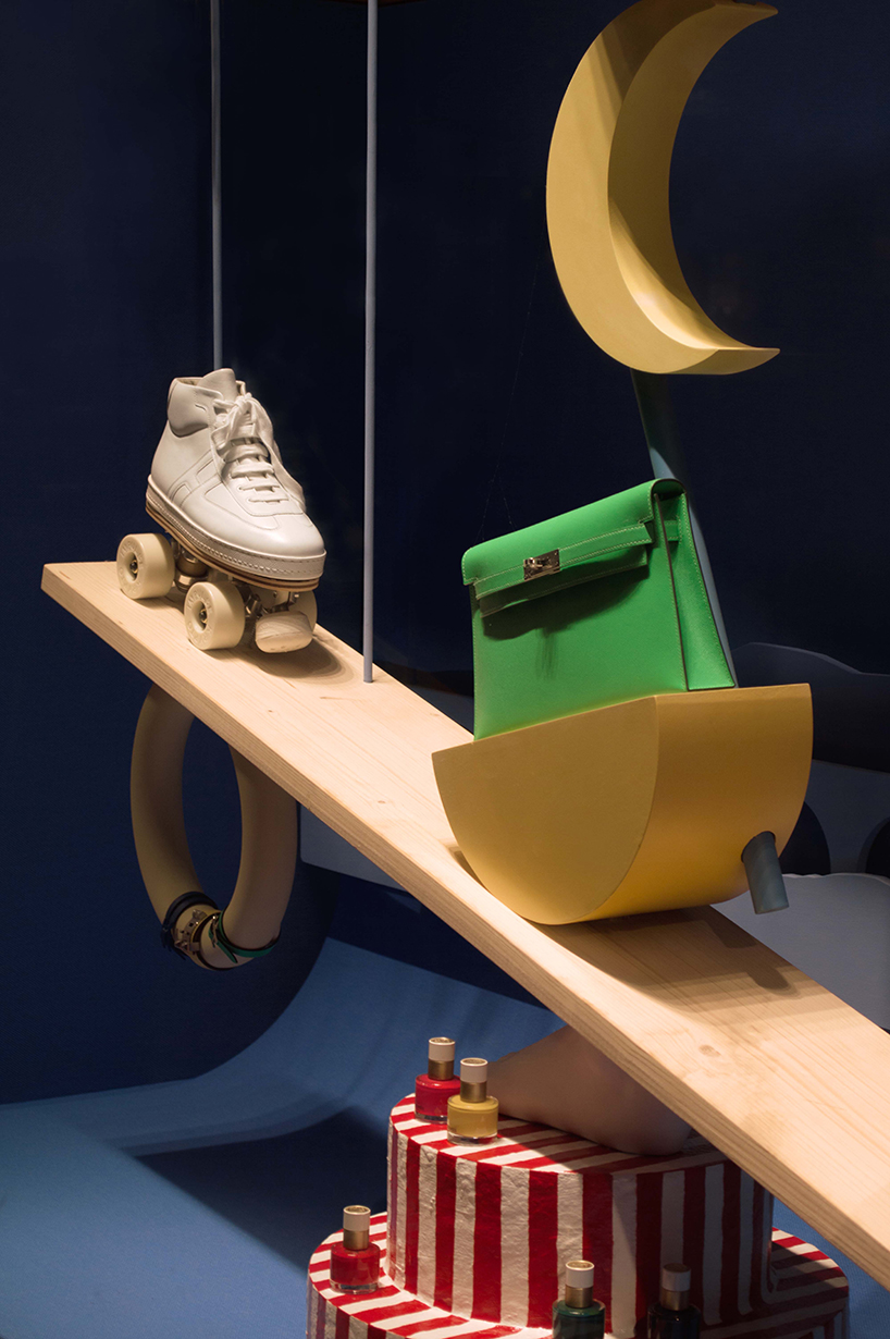 a whimsical window display intertwining the mundane and surreal marks Hermès zurich