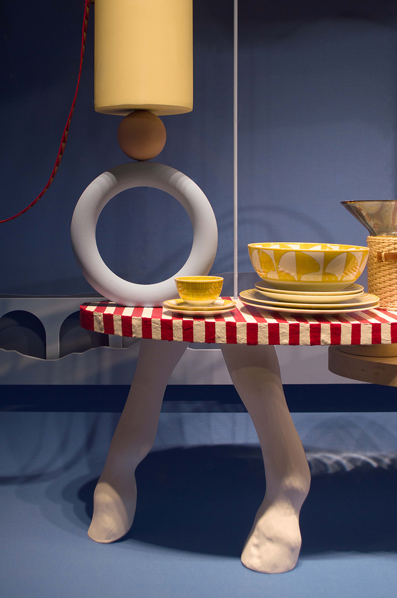 a whimsical window display intertwining the mundane and surreal marks Hermès zurich