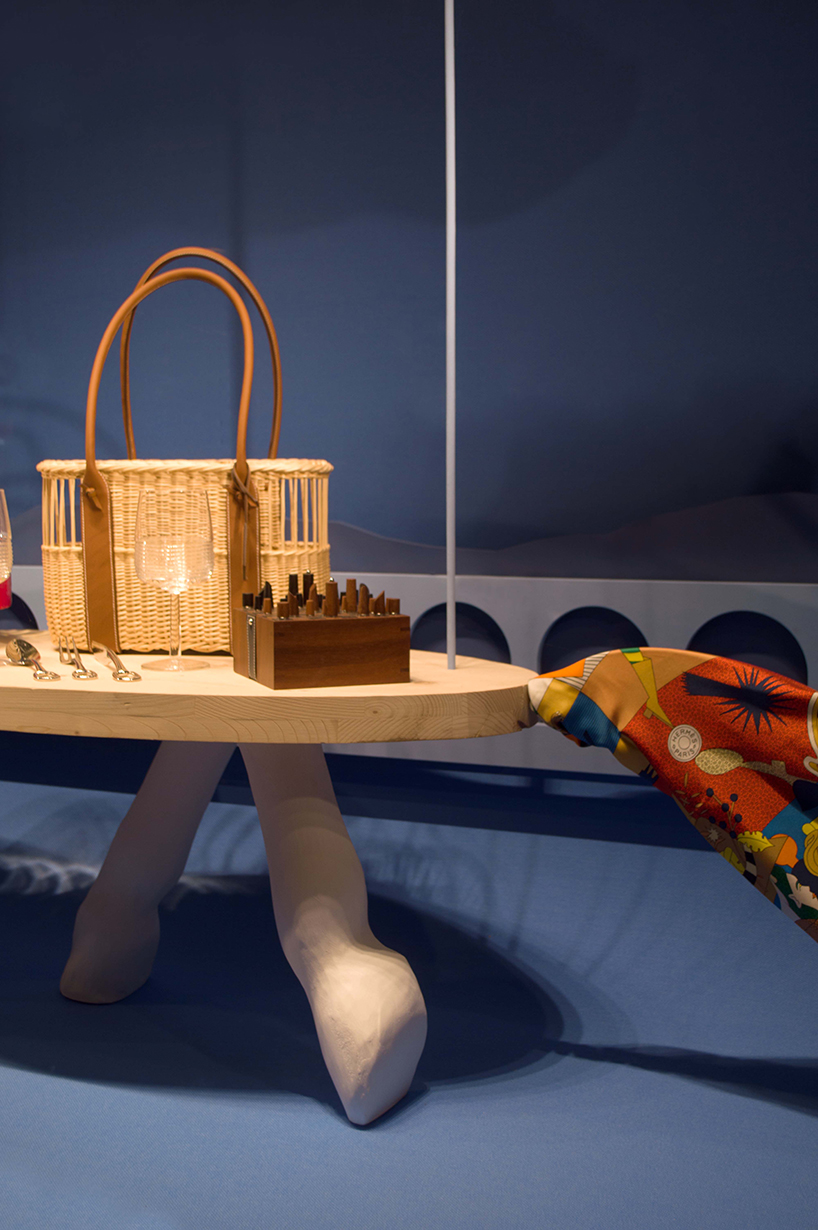 a whimsical window display intertwining the mundane and surreal marks Hermès zurich