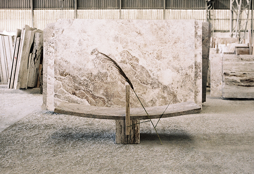 leonardo talarico handcrafts monolithic benches and fountains from tuscan travertine