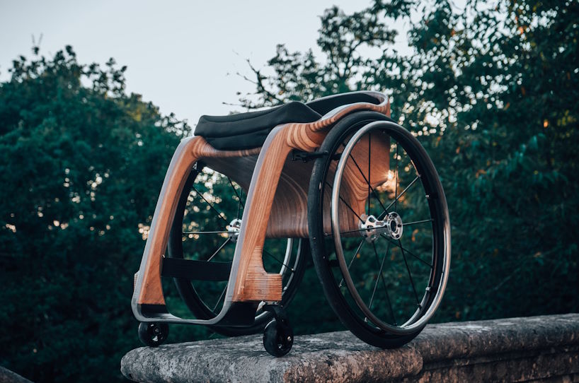 paul de livron crafts wooden wheelchair for the pope with burnt oak beams from notre-dame