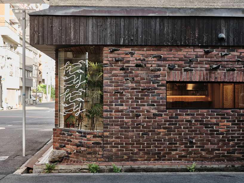 renovated restaurant by stod preserves its historic brick frame in japan - 2