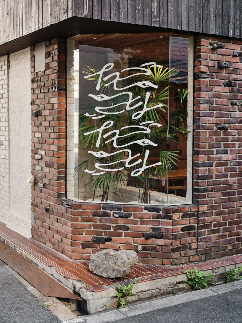renovated restaurant by stod preserves its historic brick frame in japan - 3