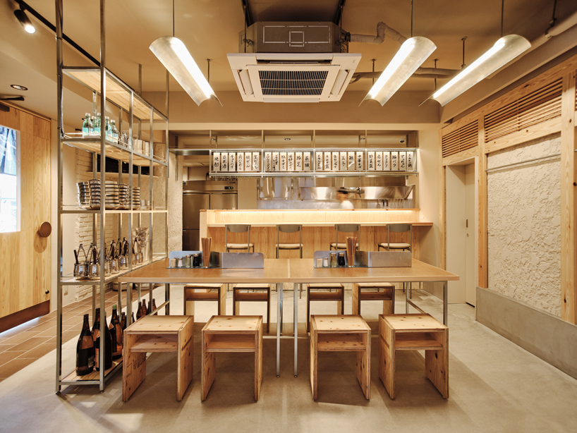 renovated restaurant by stod preserves its historic brick frame in japan - 4