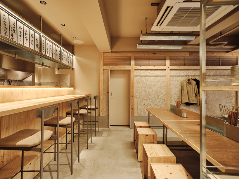renovated restaurant by stod preserves its historic brick frame in japan - 5