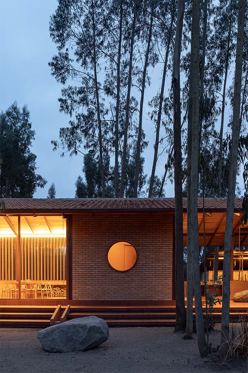 gabriel rivera arquitectos tucks home & stables amid expanse of eucalyptus trees in ecuador