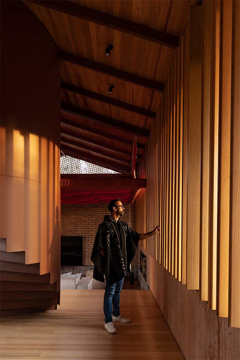 gabriel rivera arquitectos tucks home & stables amid expanse of eucalyptus trees in ecuador