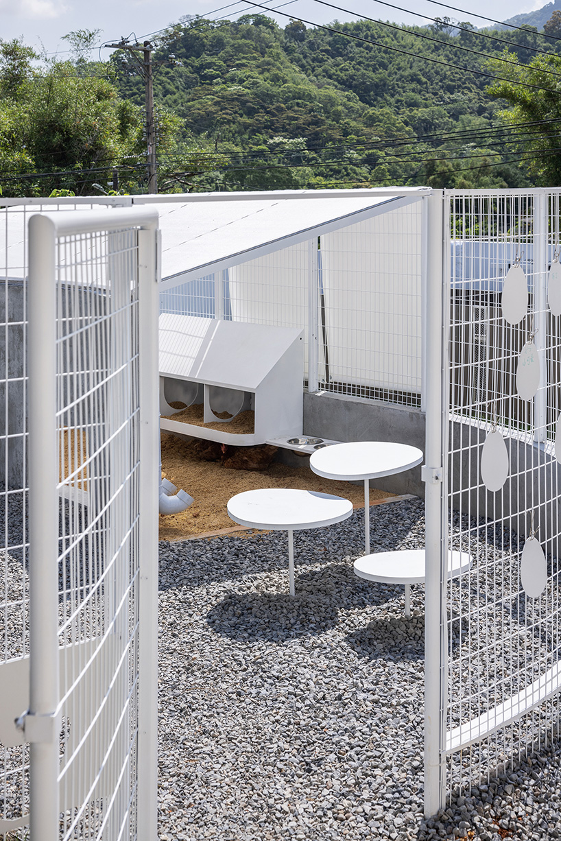 curved white fence creates an agricultural education field in taiwan