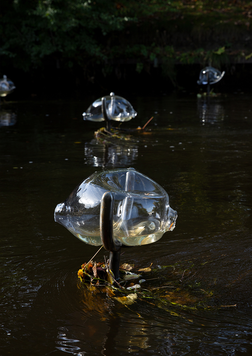 marte mei's pipes and glass bulbs activate eindhoven's dommel to communicate with its surroundings