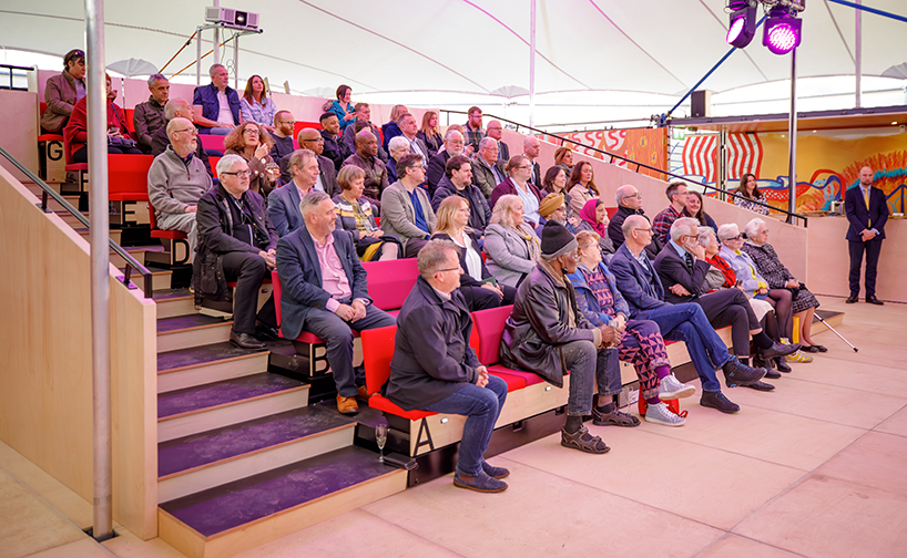 mobile event tent serves as adaptable arts center to foster community access across england