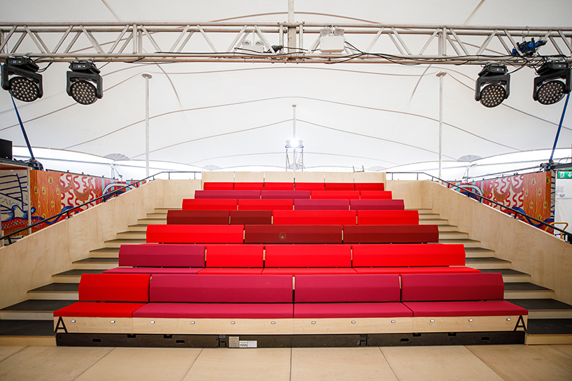 mobile event tent serves as adaptable arts center to foster community access across england