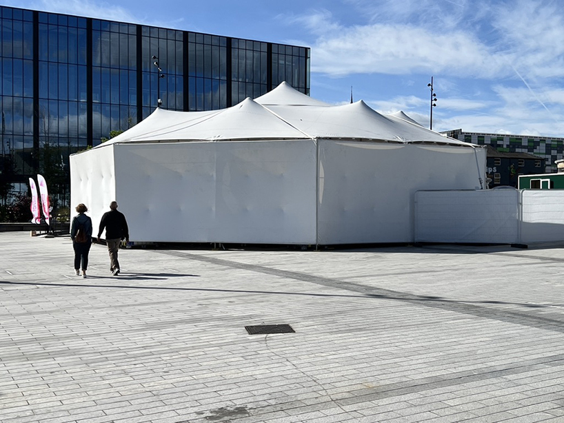 mobile event tent serves as adaptable arts center to foster community access across england