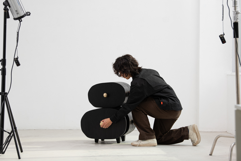 irregularly stacked volumes capture the korean tradition of wish-making in jaewoo ahn's wooden cabinet