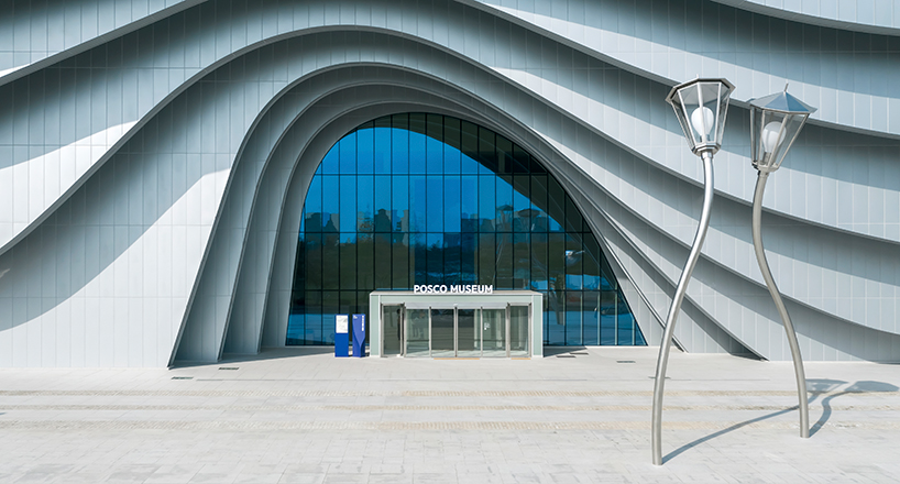 sinuous steel ribs flow around unsangdong architects' art museum in korea