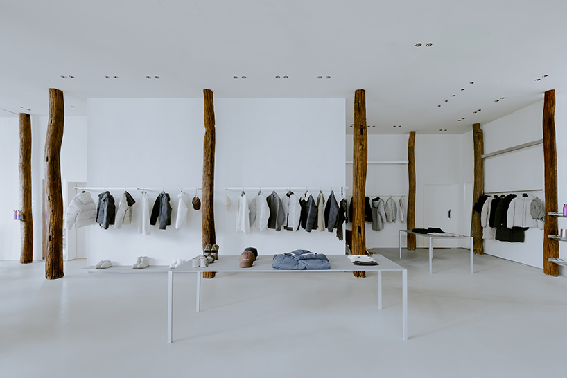 kooo architects creates a camping with reclaimed timber beams 1