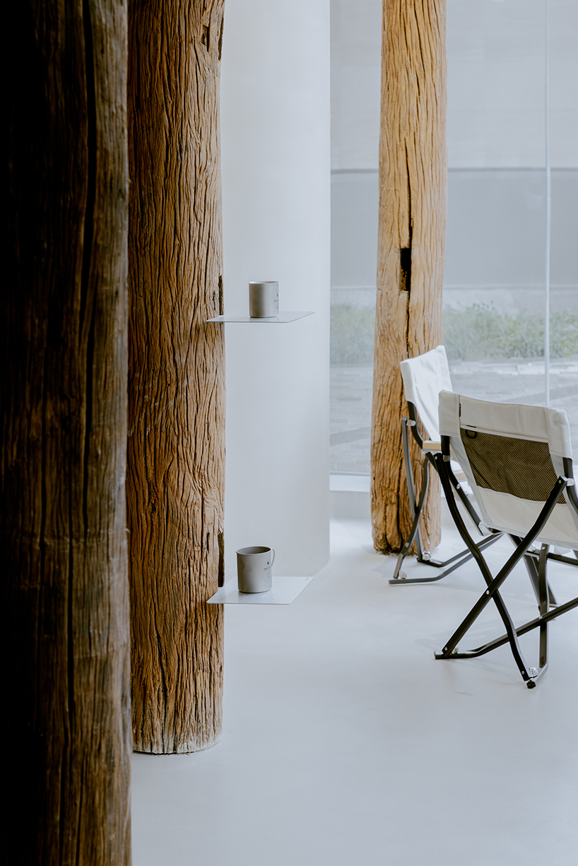  a camping with reclaimed timber beams 11