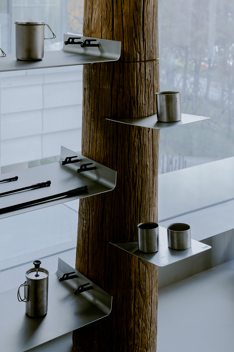 a camping with reclaimed timber beams 12