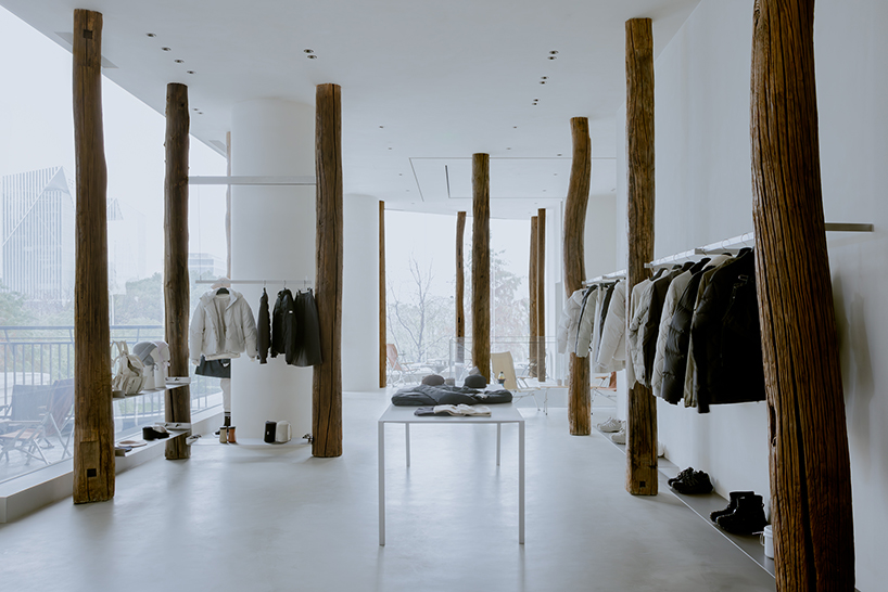 kooo architects creates a camping with reclaimed timber beams 2