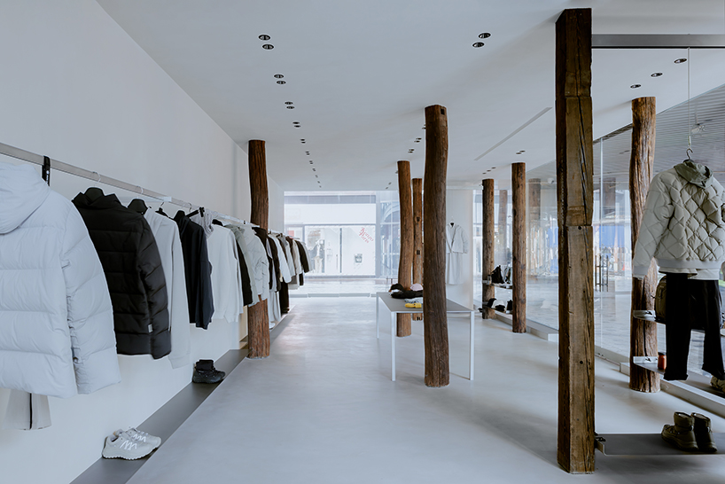 kooo architects creates a camping with reclaimed timber beams 3