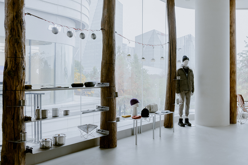 kooo architects creates a camping with reclaimed timber beams 4