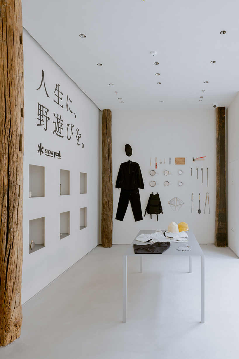 kooo architects creates a camping with reclaimed timber beams 6