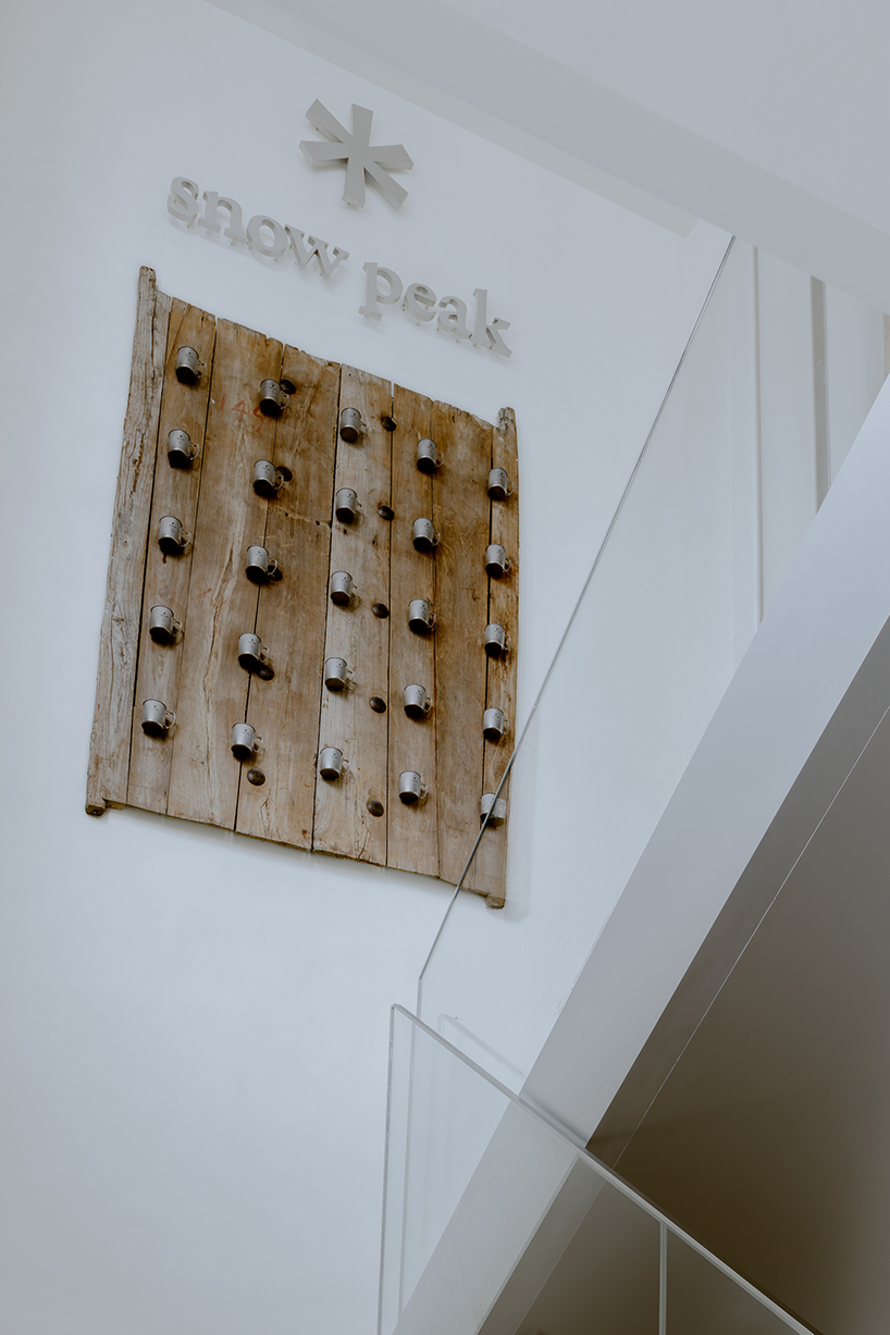 kooo architects creates a camping with reclaimed timber beams 8