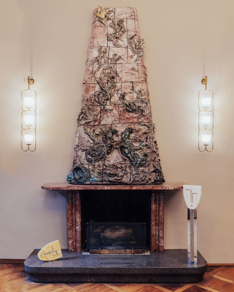 berenice curt sculpts androgynous faces into reclaimed marble at milan design week