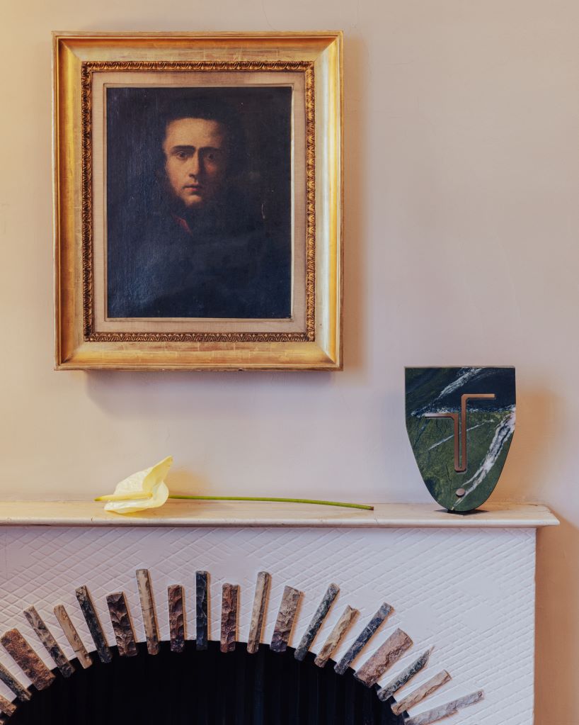 berenice curt sculpts androgynous faces into reclaimed marble at milan design week