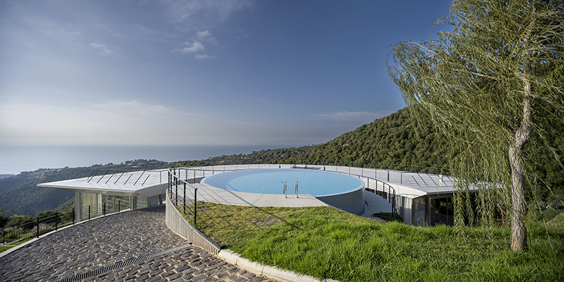 blankpage architects’ skyhaven villa wraps around hilltop valley in lebanon