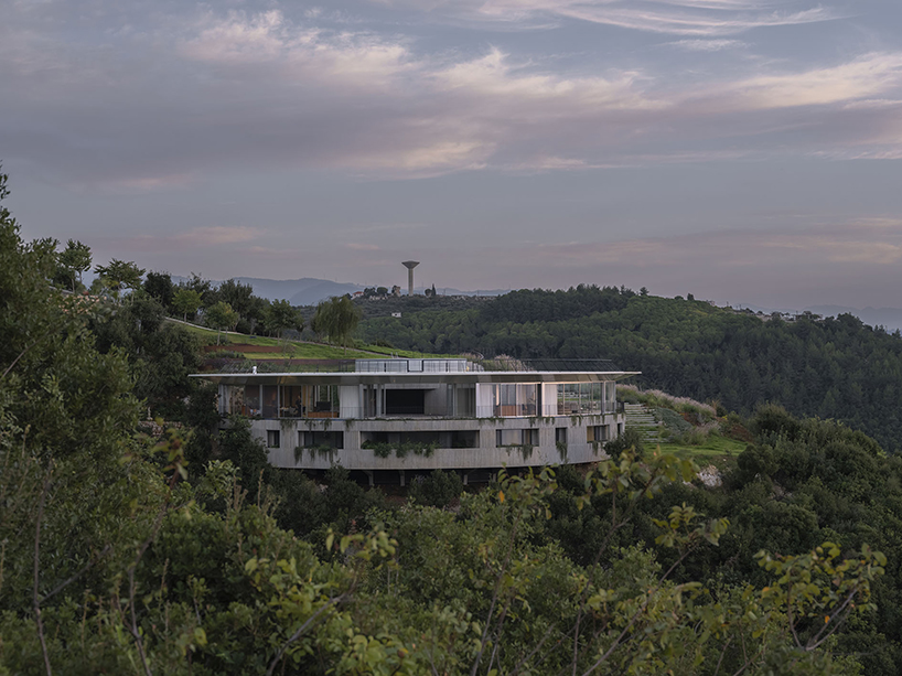 blankpage architects’ skyhaven villa wraps around hilltop valley in lebanon