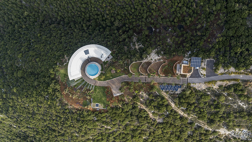 blankpage architects’ skyhaven villa wraps around hilltop valley in lebanon