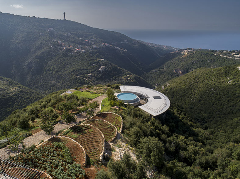 blankpage architects’ skyhaven villa wraps around hilltop valley in lebanon