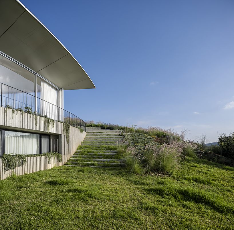 blankpage architects’ skyhaven villa wraps around hilltop valley in lebanon