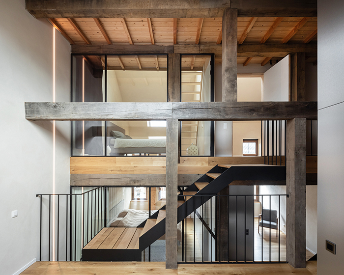 slaughterhouse café turns into sunlit multi-level residence by atelier vens vanbelle in belgium